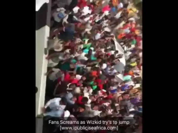 Fans Scream As Wizkid Tries To Jump Off From A High Hill Van (Video)